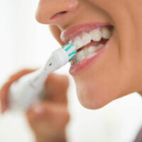 Teeth cleaning guide with Oral B electric toothbrush